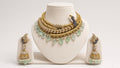 Mayura Sabz Peacock Choker Set, shown on a display bust