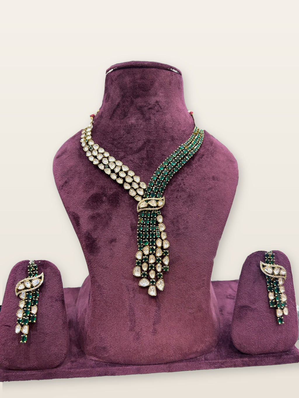 Sabz Polki Cascade Necklace Set, photographed on a display bust